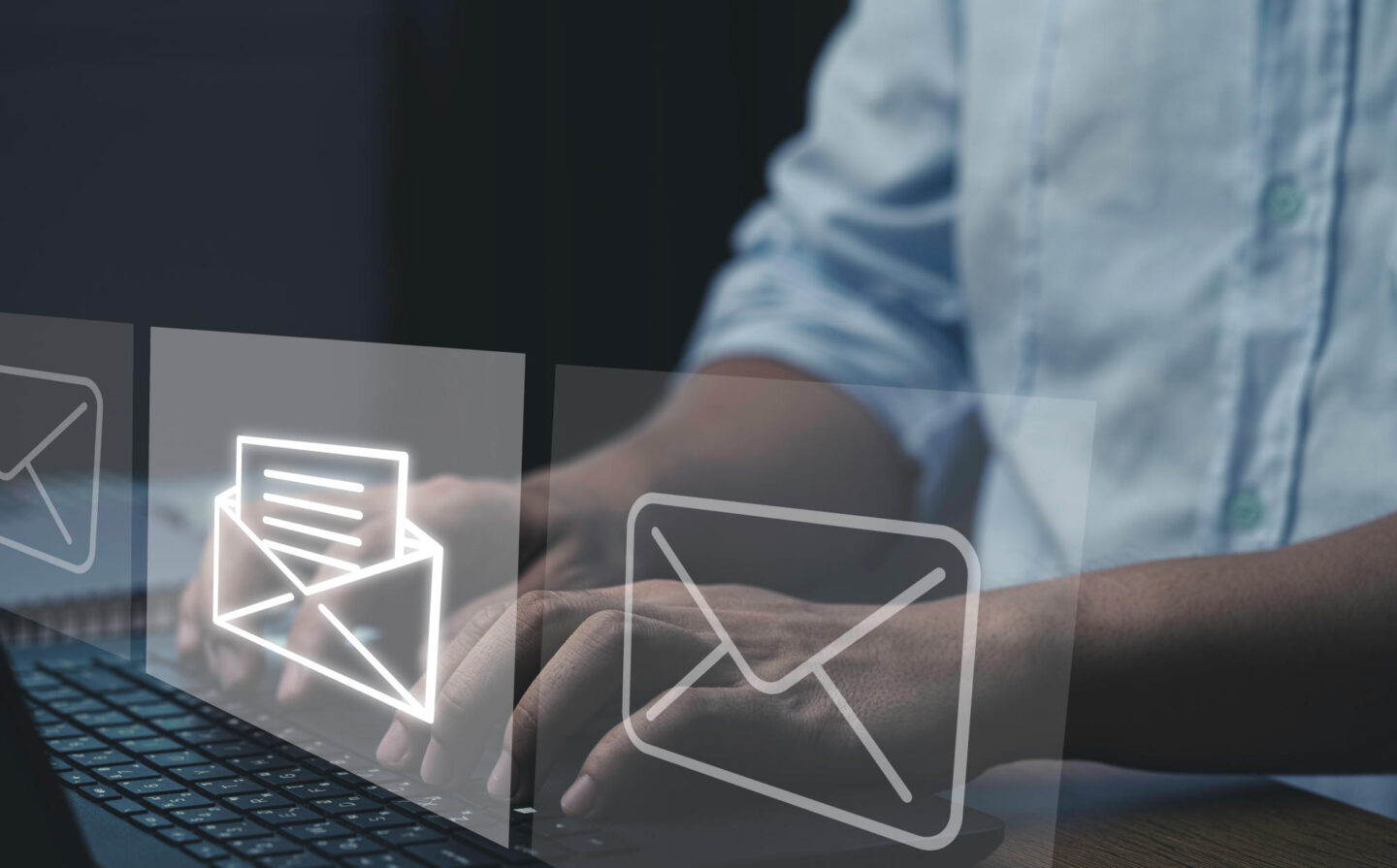 Businessman typing laptop computer to open and send email to cus