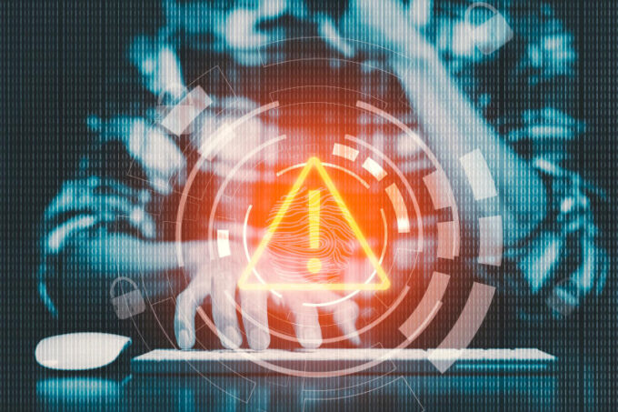 Hand Hacker touch laptop or smartphone and Touching in graph Screen code of a media screen on the White background Technology Process System Business and hacks online concept Copy space