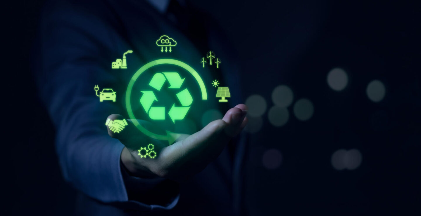 businessman holding circular economy icons Circular economy concept for future business growth and environmental sustainability and reduce pollution for future business