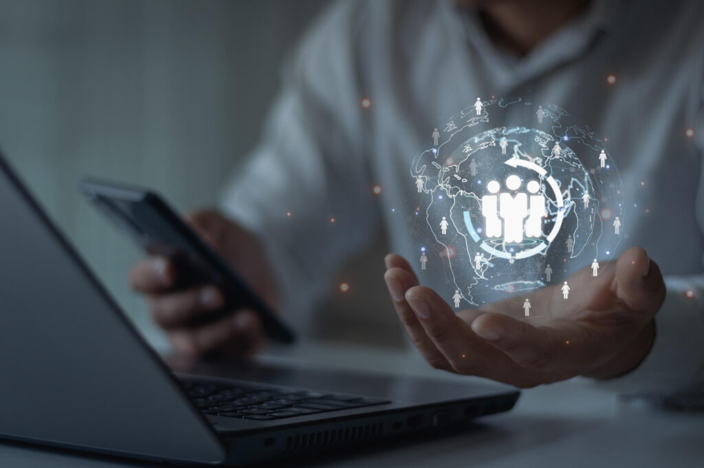 Target customer customer network concept Business people hold a digital globe with a customer network AI analytics digital online marketing Marketing automation for personalized marketing - IMD Business School - IMD Business School