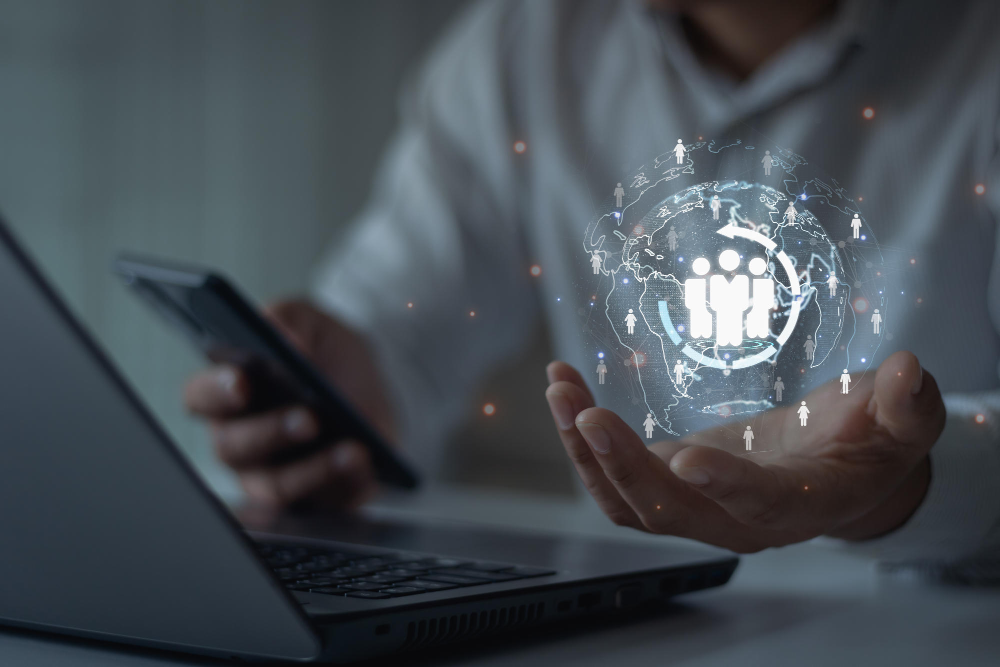 Target customer customer network concept Business people hold a digital globe with a customer network AI analytics digital online marketing Marketing automation for personalized marketing