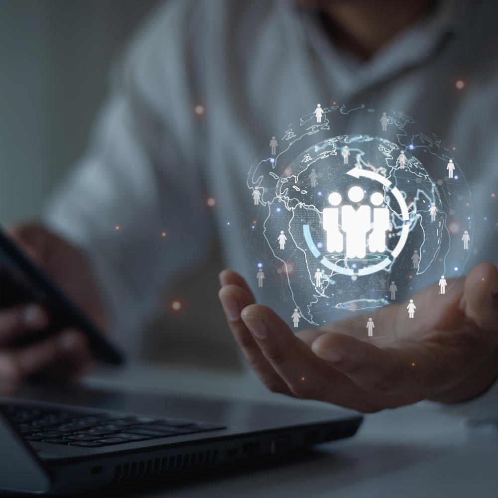 Target customer customer network concept Business people hold a digital globe with a customer network AI analytics digital online marketing Marketing automation for personalized marketing2