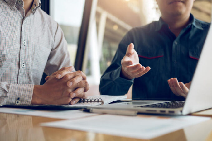 Two businessmen are disputing about the wrong financial budget o