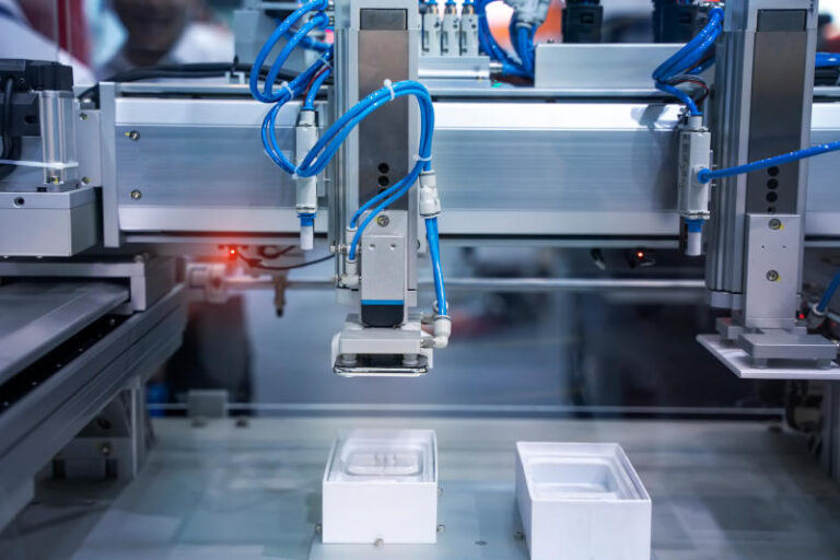 robot with vacuum suckers with conveyor in manufacture phone factorySmart factory industry 40 concept