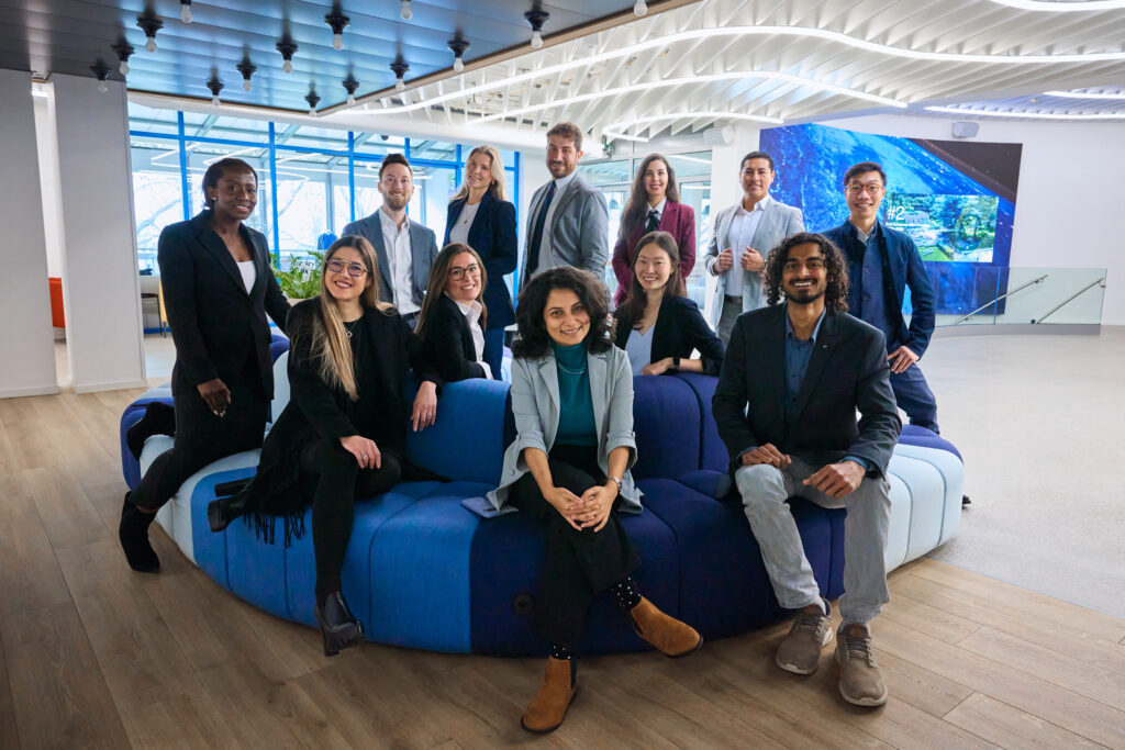 MBA students from the Class of 2026 smiling to camera - IMD Business School