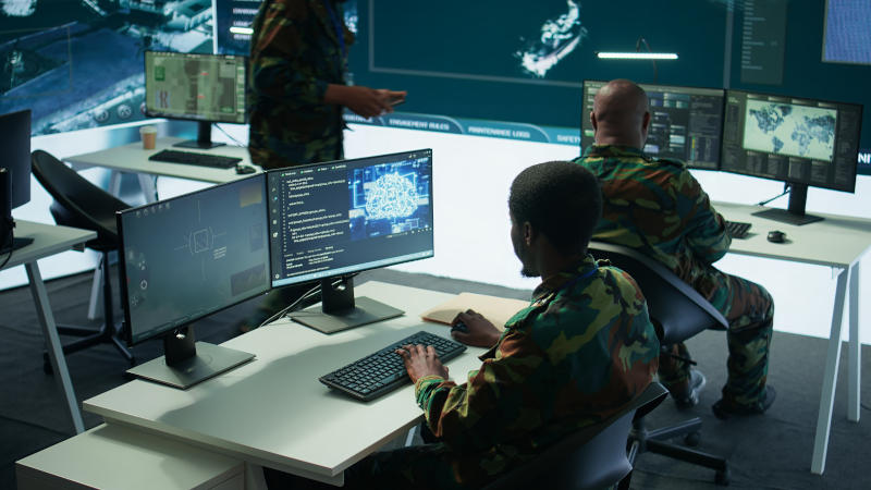 IT software engineer collecting real time data from neural network AI brain