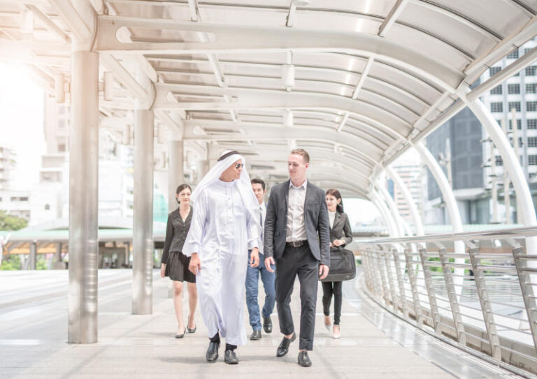 global business Arab and international business people walk and talk business negotiations and vision future plan