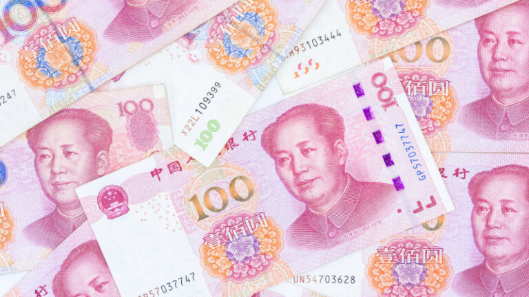 Chinese paper currency Yuan renminbi bill banknotes on white background Banknote one hundred yuan More chinese yuan background China or economy of Asia growth US trade war concept