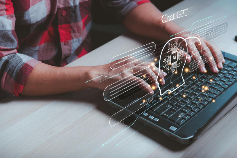 AI chat bot Chatbot Chat with AI man using laptop enter comma