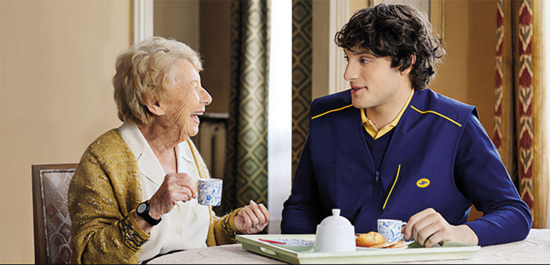A postie pops in for a tea and a chat on his morning round