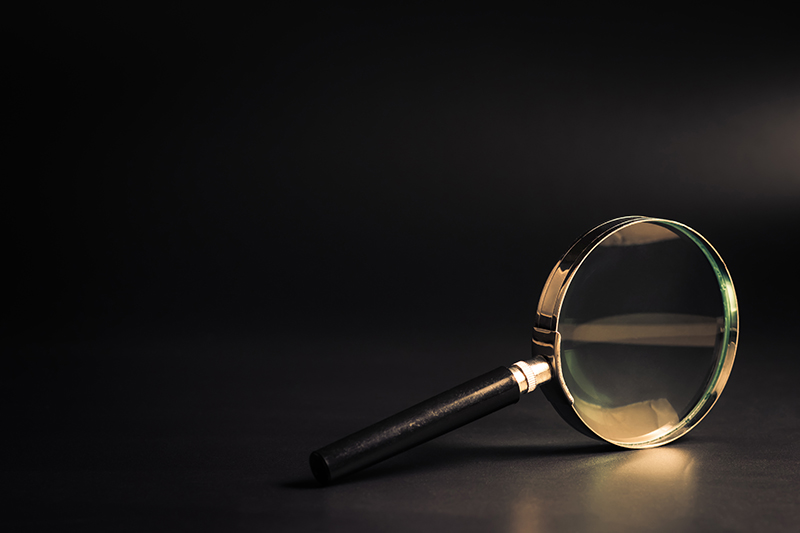 Magnifying Glass on Black - IMD Business School