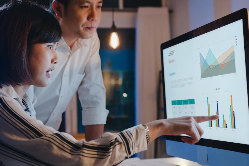 Group of Asia businessman and businesswoman using computer prese