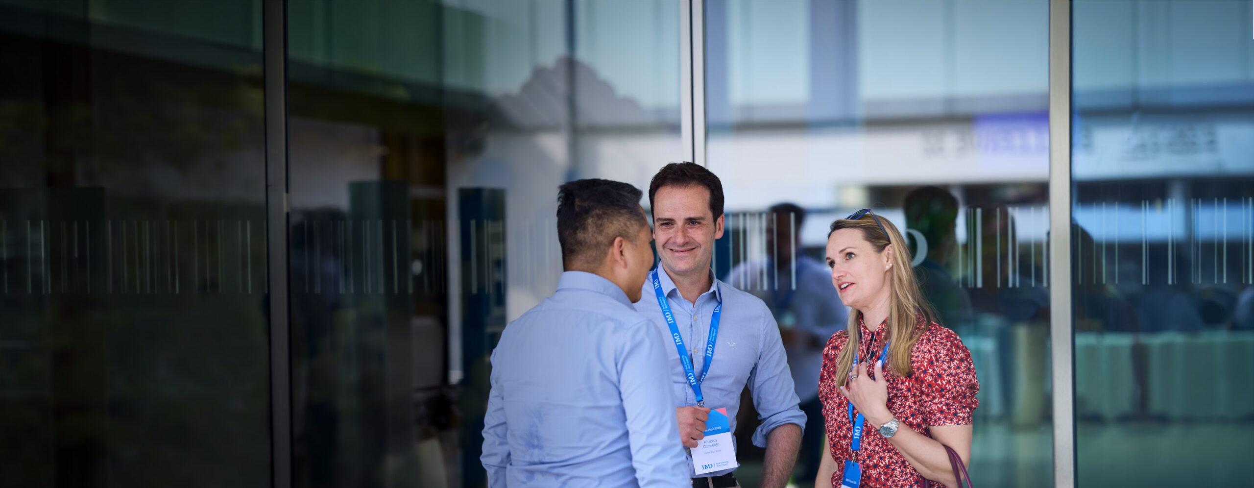 IMD EMBA program participants and alumni meeting on campus - IMD Business School