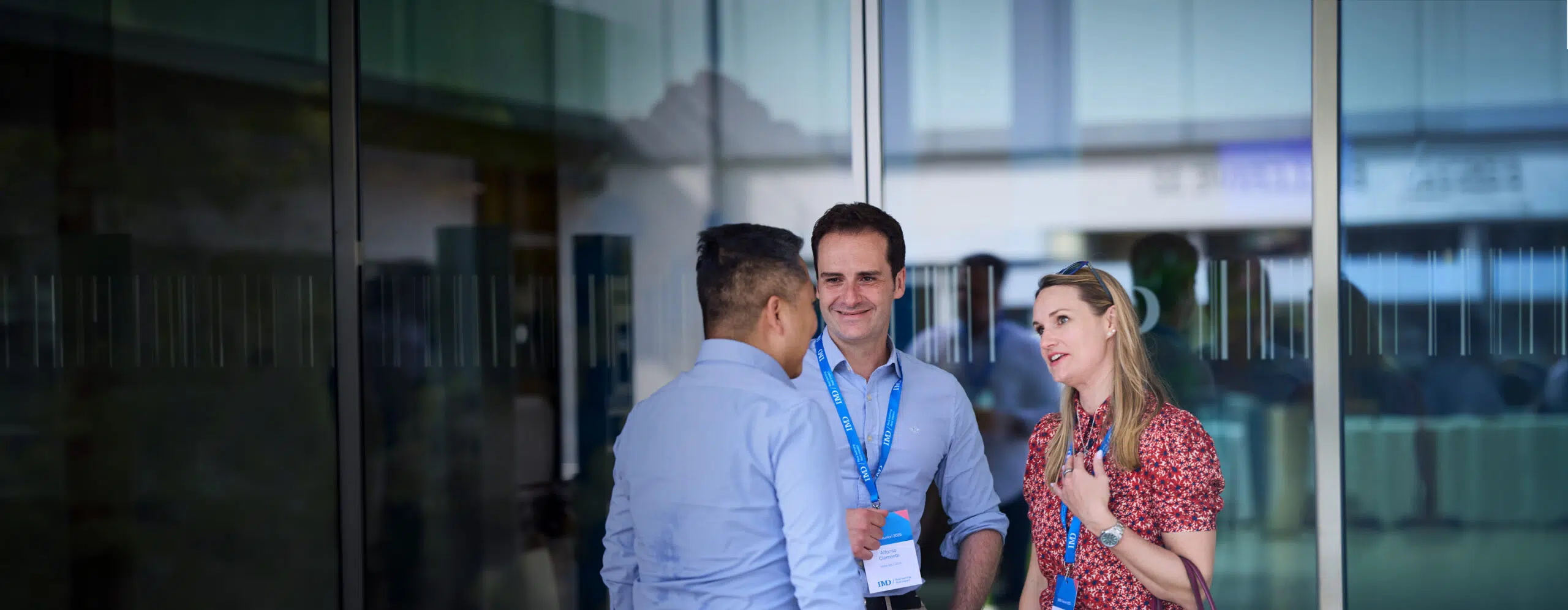 IMD EMBA program participants and alumni meeting on campus - IMD Business School