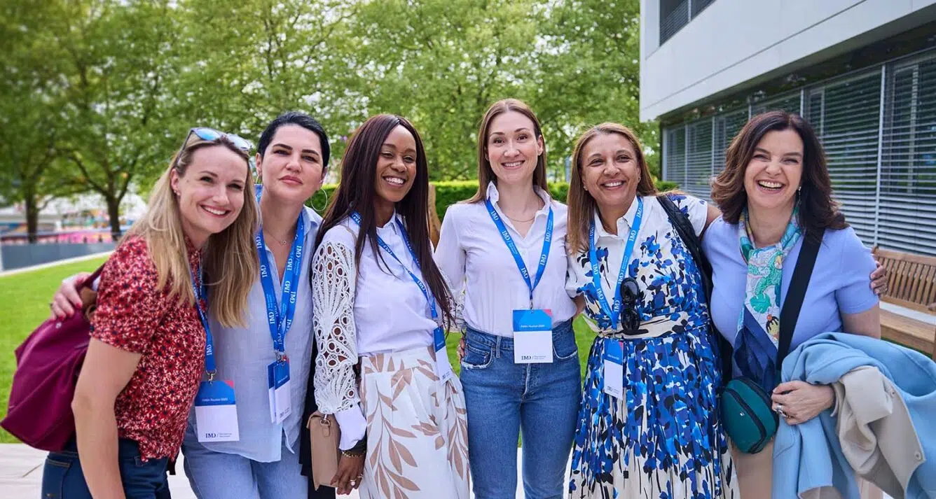 A group of IMD EMBA women attending an alumni reunion - IMD Business School