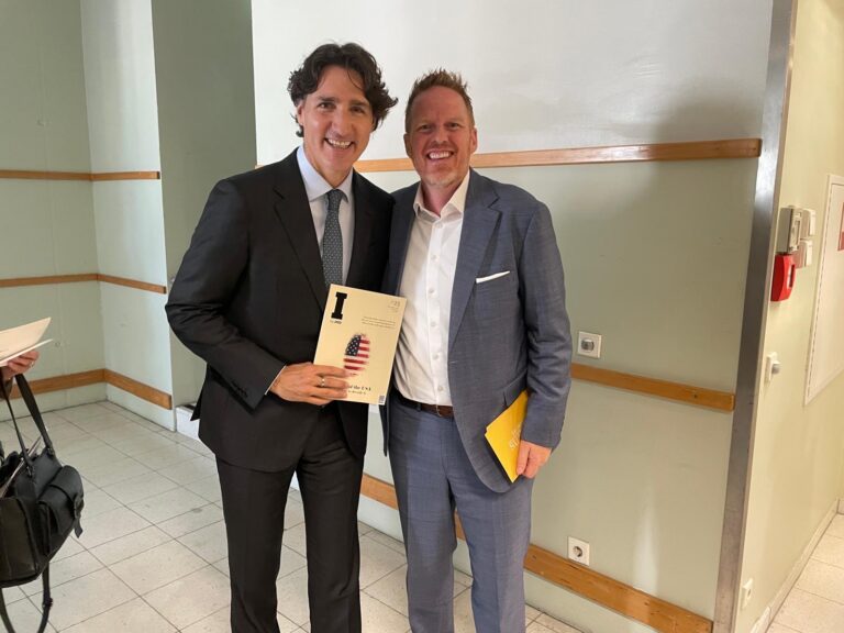 IMD President David Bach (right) with Justin Trudeau