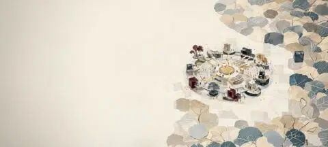 Aerial view of a circular urban plaza with pathways and small buildings around a central fountain, set on a beige background with leaf-patterned collage to the right. - IMD Business School - IMD Business School