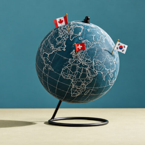 Globe on a desk showcasing 3 countries